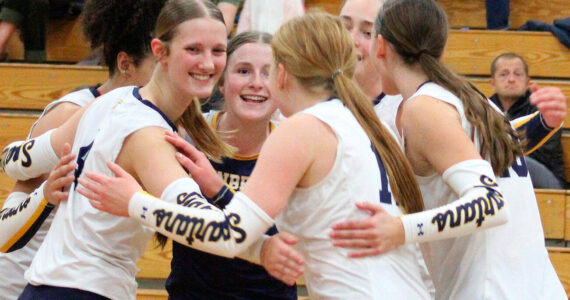 Luke Caputo/Kitsap News Group photos
The Bainbridge Spartans celebrate after winning a point in their home match against Kingston Sept. 25.