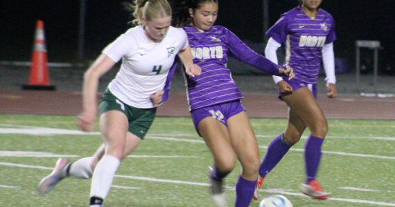 Luke Caputo/Kitsap News Group photos
Viking Abby Marrero battles for the ball with a Port Angeles defender with Viking Addy Jueco looking on in a 2-0 NK home loss to the Roughriders Oct. 16.