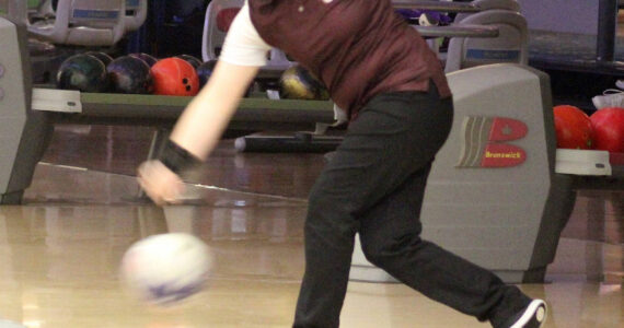 Luke Caputo/Kitsap News Group
Madisyn Furlong of SK rolls the ball down the lane in a loss to the Emerald Ridge Jaguars Nov. 18 at the Hi-Joy Bowl in Port Orchard.