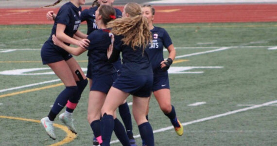 Brent Anderson courtesy photos
The Crosspoint Christian Wildcats celebrate Brooke Berens’ goal in a 1-0 win over the Freeman Scotties in the 1B/2B girls soccer state championship Nov. 22 in Tumwater.