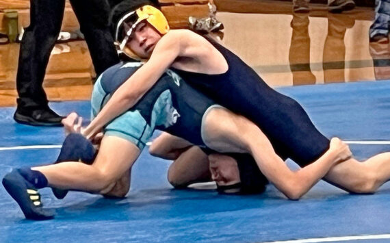 Luke Caputo/Kitsap News Group photos
Bremerton Knight Kode Kulrat pins a Gig Harbor wrestler in a meet Dec. 11 at Bainbridge High School.