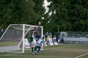 Pumas goalkeeper Aaron Fenlason saves a close call Saturday.
