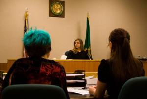 Prosecution advocates Morgan Graziani and Kes Osborne look on as judge Kayla Rivera-Hoskinson addresses the youth court last week.