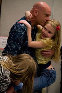 David Templeton holds onto his daughter