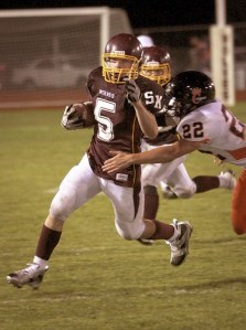 SK senior Bo Ottak rumbles for yardage in the Wolves’ Narrows League showdown on Friday against Central  Kitsap.