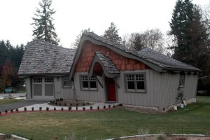 The Hobbit House has been constructed over the past few years on Bainbridge Island’s High School Road. It is now complete and owner Chris Whited plans to rent it out as a vacation rental for island visitors. It includes fairy tale-styled roofs and a working waterwheel.