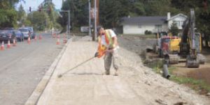 Mark Broderson of Seton Construction works on the Bucklin Hill Road project Wednesday. Beginning Sept. 8