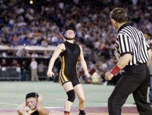 Bremerton's Lauren Richardson celebrates after pinning Jomae Alewine of Lake Stevens in the Class 3A 103-pound girls state championship match. Richardson