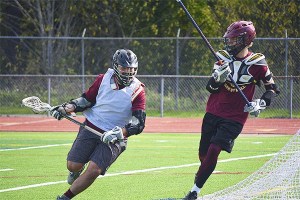 Wolves player Alex Scott takes on a defender during a drill at practice. Scott will play at Adam State University after he graduates.