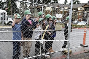 A group of future Kingston Boys & Girls Club members check out the progress of construction of the Village Green Community Center