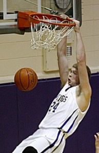 North Kitsap senior forward Taylor Hoffer slams the ball during third quarter action at home Tuesday night. A photo gallery from this game will be loaded soon.