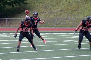 Central Kitsap High School quarterback Brett McDonald throws a pass during the first half of the Cougars' 47-7 win over Shelton High School Sept 17 at Silverdale Stadium.