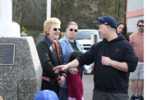 Silverdale Pee Wees President Rich Huddleston talks to Dona Ross