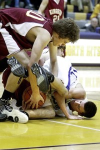 Kingston High School's Ry Ravenholt and North Kitsap's Kyle Erickson battle it out for the ball during action at North Kitsap Tuesday.