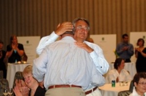 Mayor Cary Bozeman hugs Gary Sexton