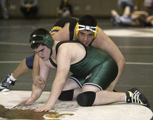 Knight Michael Aguada had an early edge against Klahowyas Brett Harkness at 215-pounds Wednesday but fell 4-1.