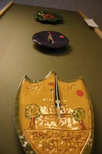 Gotta love the irony of art. A Bremerton Police Badge in the juvie show.