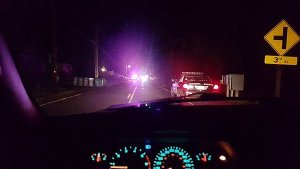 A photograph made by Hailey Mae Carstensen-Smith shows law enforcement vehicles involved in a car chase Dec. 9.