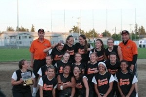 The Central Kitsap fastpitch team celebrates a second-place finish at the Class 4A West Central District III fastpitch tournament Saturday at Sprinker Recreation Center in Tacoma.