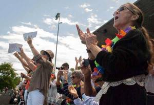 Family and friends cheer on the Kingston High School class of 2014 during the graduation ceremony June 7 at North Kitsap Stadium.