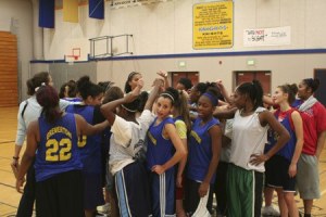 Head coach Debbie Lindgren and the Bremerton girls basketball team wraps up practice on Saturday