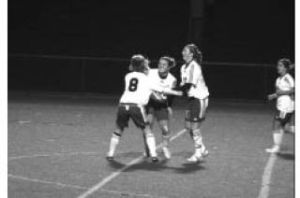 Olympic’s Anndrea O’Leary (middle) celebrates with teammates after scoring a goal in the 24th minute in the Lady Trojans 2-0 win over Timberline Tuesday at Silverdale Stadium.