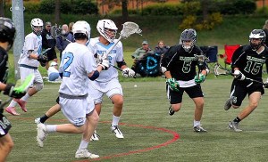 Klahowya’s Avery Schuette (5) and Tanner Weaver (15) close in on North Kitsap’s Keenen Kakuda (with ball) in the Narrows/Olympic Conference lacrosse game April 26 in Poulsbo. Klahowya prevailed 16-12.