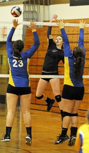 North Kitsap Bri Duchemin gets a kill during the Vikings' first match of the Olympic League Tournament against the Bremerton Knights Nov. 1. The Vikings won 3-1.
