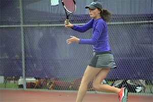 Megan Cragg returns a serve during the conference meet