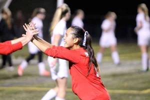 Archbishop Murphy's Cecilia Nguyen celebrates a goal against the Kingston Buccaneers Nov. 13 at North Kitsap Stadium. Archbishop won the State playoff game 5-0.