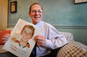 Thornton Percival of Suquamish holds a Crest toothpaste advertisement by Norman Rockwell he modeled for in 1957.