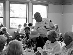 NKF&R firefighters will prepare and serve burgers with all the fixin's at the Hansville Neighbors Luncheon