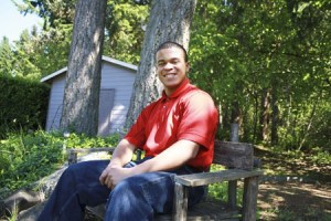 Olympic High School senior Jordan Ferraro sits on a bench that he built at home. Ferraro was under the mentorship of Pastor Sam Rachal for the last four years and will graduate Saturday at the Kitsap Pavilion.