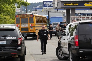 A North Kitsap school bus was stopped and a student detained for questioning after the driver said he heard the student say he had a gun aboard the bus