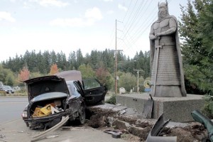 A car crashed into the 'Velkommen til Poulsbo' sign at the base of the 'Norseman' statue Sept. 22.