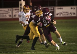 South Kitsap senior Chas Bauman was among the running backs that helped the Wolves produce 224 yards on the ground in a 38-7 homecoming win Friday night against Mount Tahoma at Joe Knowles Field.