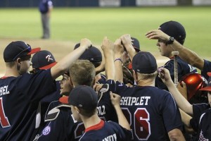 The Kitsap County All-Stars prepare for their third game of the Babe Ruth World Series for 13-year-olds Aug. 17 at Gene Lobe Fields at the Kitsap Fairgrounds. The coaches and players are in talks over the possibility of returning next year to form another All-Star team for 14-year-old tournament play.
