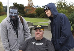 Keith Allan (“Murphy”) and Nat Zang (“10K”) pose for a photo with Doug Wood