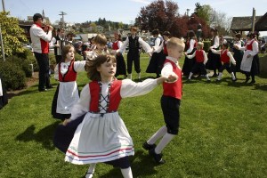 Leikarringen — traditional Scandivanian dancers — dance in front of the Sons of Norway Lodge May 1 after the dedication of the Muriel Iverson Williams Waterfront Park. Williams was a Poulsbo Library Board president