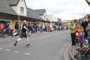 Crowds lined up along the sidewalks of Front Street in Poulsbo to cheer on the participants of the 5-mile and 1-mile runs during the 36th annual Viking Fest Road Race May 18.