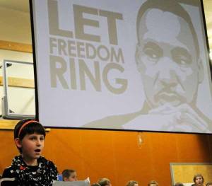 Suquamish Elementary student Maya Wickens and two fifth grade classes perform Stevie Wonder's 'Happy Birthday