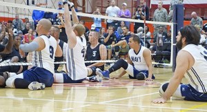 Bremerton's John Edmonston (center) gets ready for a volley.