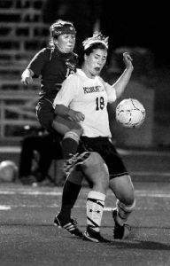Kingston High School defender Sophia Baetz controls the ball during home action this week. The Bucs tied with the undefeated North Mason Bulldogs  with a score of 3-3 in double overtime. .