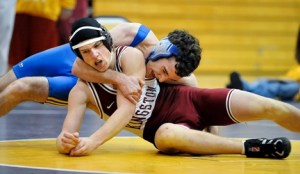 Kingston's Ian Chosey beat Bainbridge Island's Evan Jahrman 6-2 during wrestling action Tuesday at Bainbridge High School.