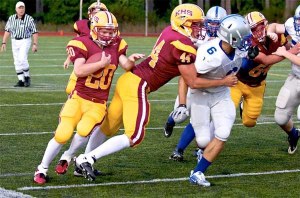 Kingston running back Brady Sundquist (number 44)