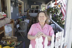 Kingston Food Bank director Barb Fulton stands outside the Illinois Avenue building that will continue to be rented by the food bank