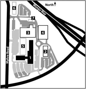 Harrison’s proposed Silverdale expansion: 1) Existing hospital. 2) Medical office building 3) New hospital building with towers. 4) Parking garage. 5) Healing garden. 6) Pond. 7) Helicopter pad. New parking is dark grey and existing parking is light grey.