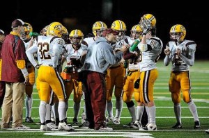 Kingston head coach Dan Novick discusses the Buccaneers' performance against the Lindbergh Eagles during halftime in November 2010 when the team went to the playoffs for the first time in program history.