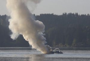 A 30-foot boat caught fire this morning by the Agate Pass bridge.