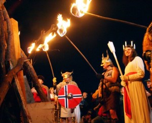 The Lucia Bride lights the bonfire on the Poulsbo waterfront